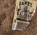 Uncle Luke's Kansas Krunch Honey Mustard flavor bag on raw wheat berries