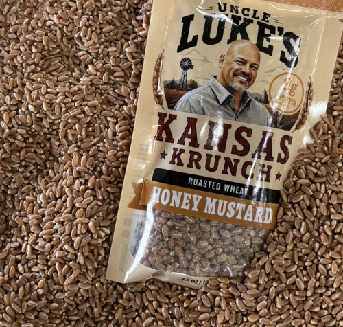 Uncle Luke's Kansas Krunch Honey Mustard flavor bag on raw wheat berries